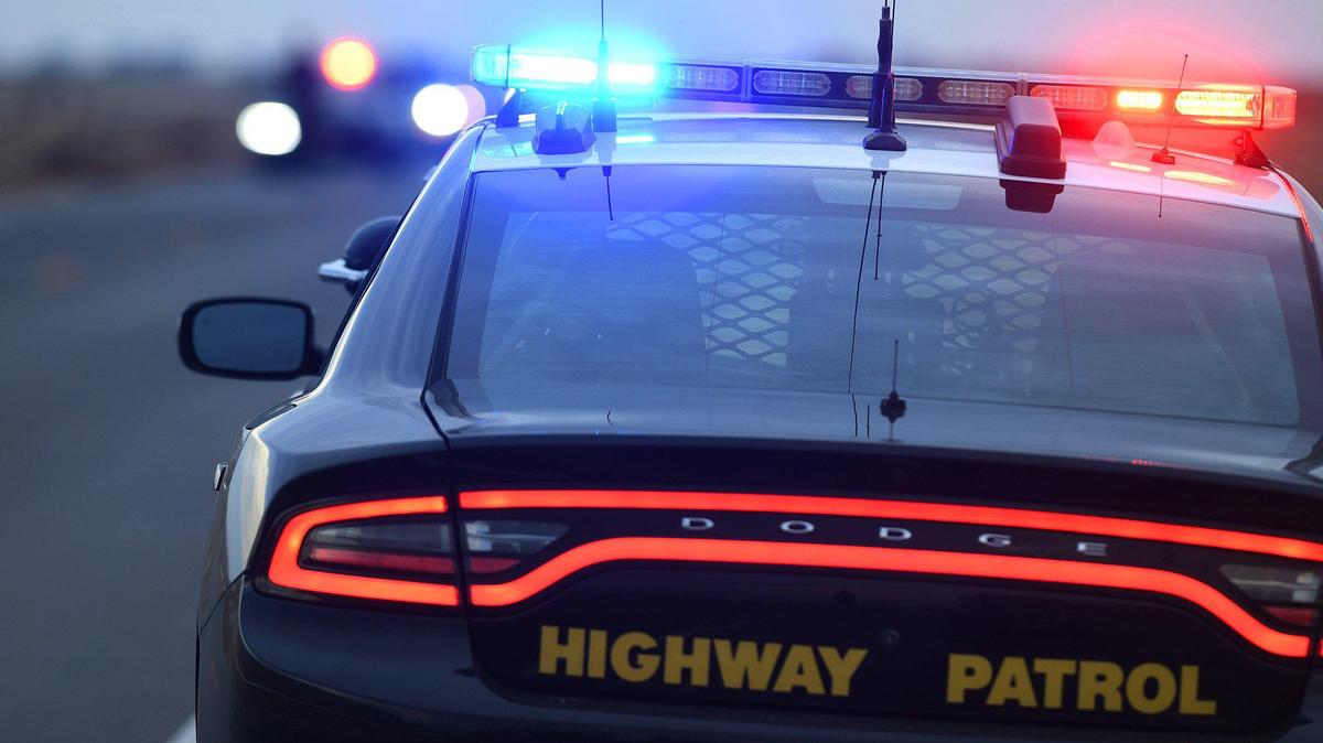 Two California Highway Patrol officers are facing charges that they accepted bribes to forge documents related to imported cars.