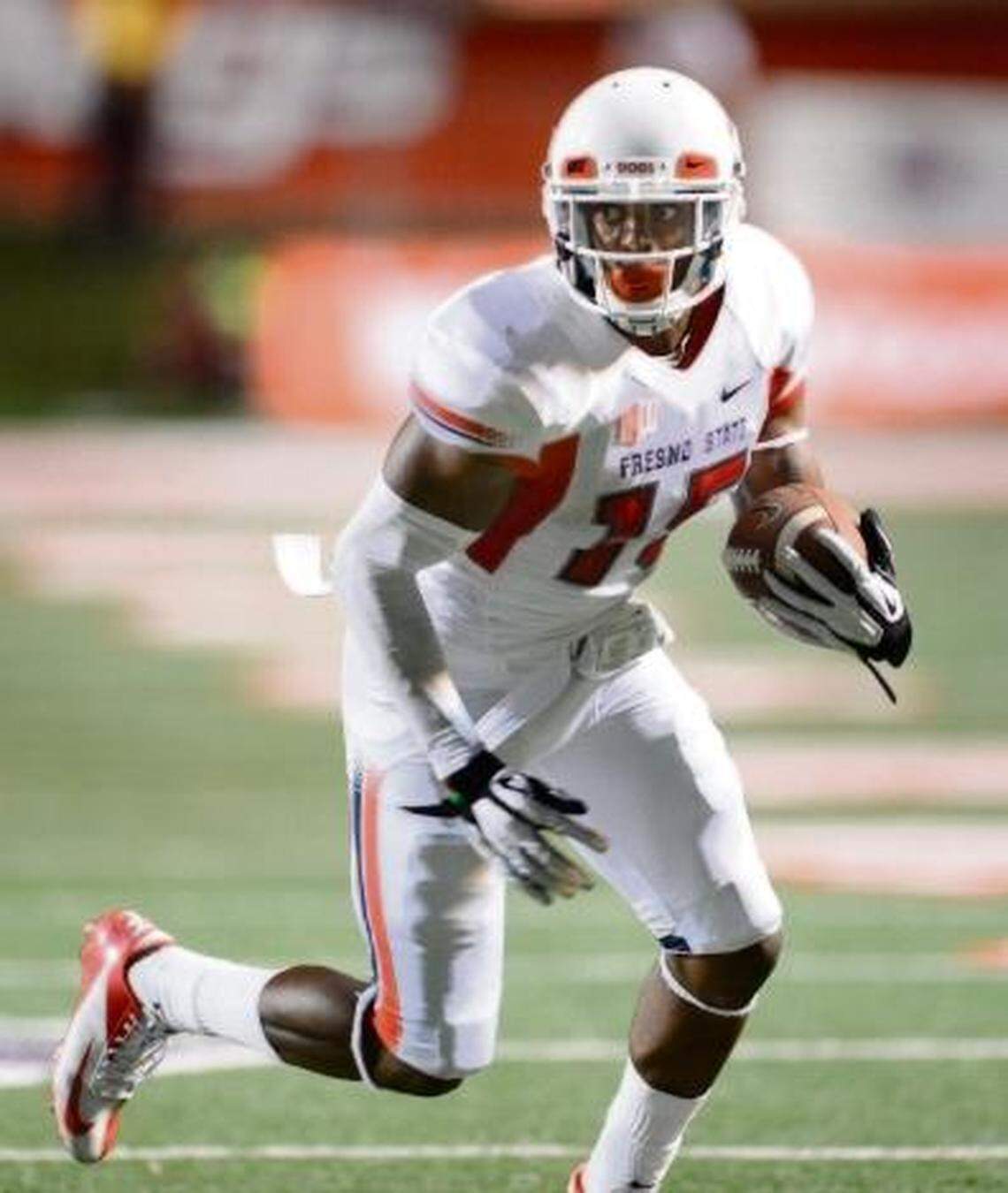 Fresno State’s Davante Adams takes a pass down the sidelines in the Bulldogs game against Rutgers at Bulldog Stadium on Thursday, August 29, 2013.
