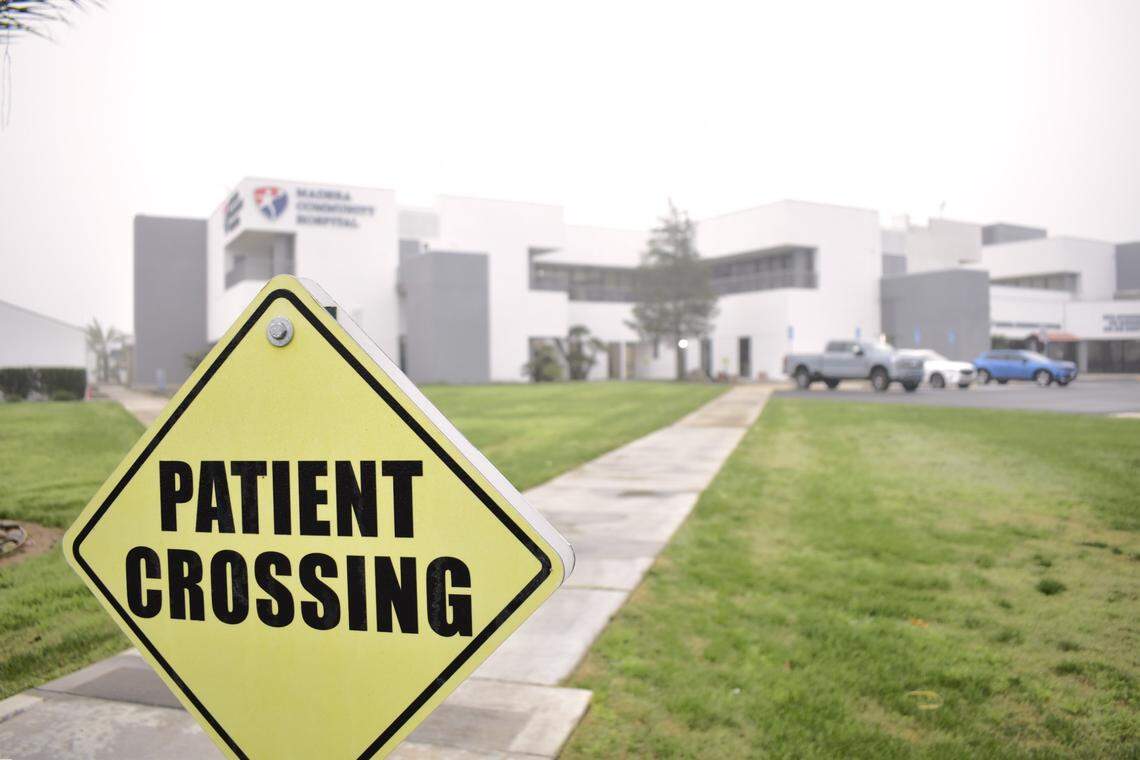 Vehicles are parked outside of Madera Community Hospital on Monday, Dec. 30, 2024. The hospital has been closed since December 2022 and is looking to reopen with its new management firm, American Advanced Management Inc.