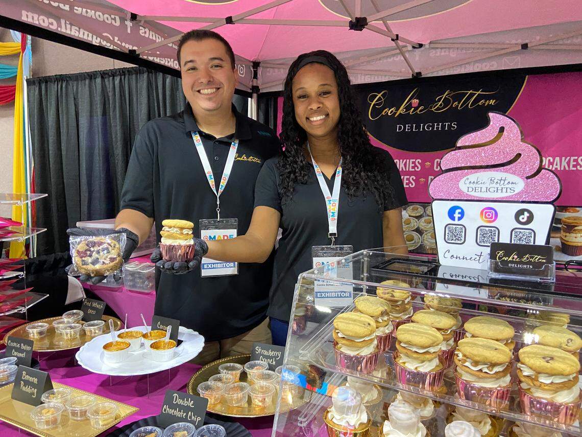 Deirdre Wyrick, right, posing with her husband, is the founder of Cookie Bottom Delights. The company makes “luxury cupcakes” and large stuffed cookies.