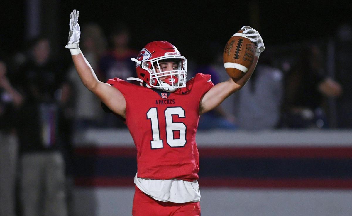 Sanger’s Marshall Pittman raises his arms as he scores Sanger’s last touchdown against Bullard for a final score of 42-6 at Tom Flores Stadium Friday, Oct. 21, 2022 in Sanger.