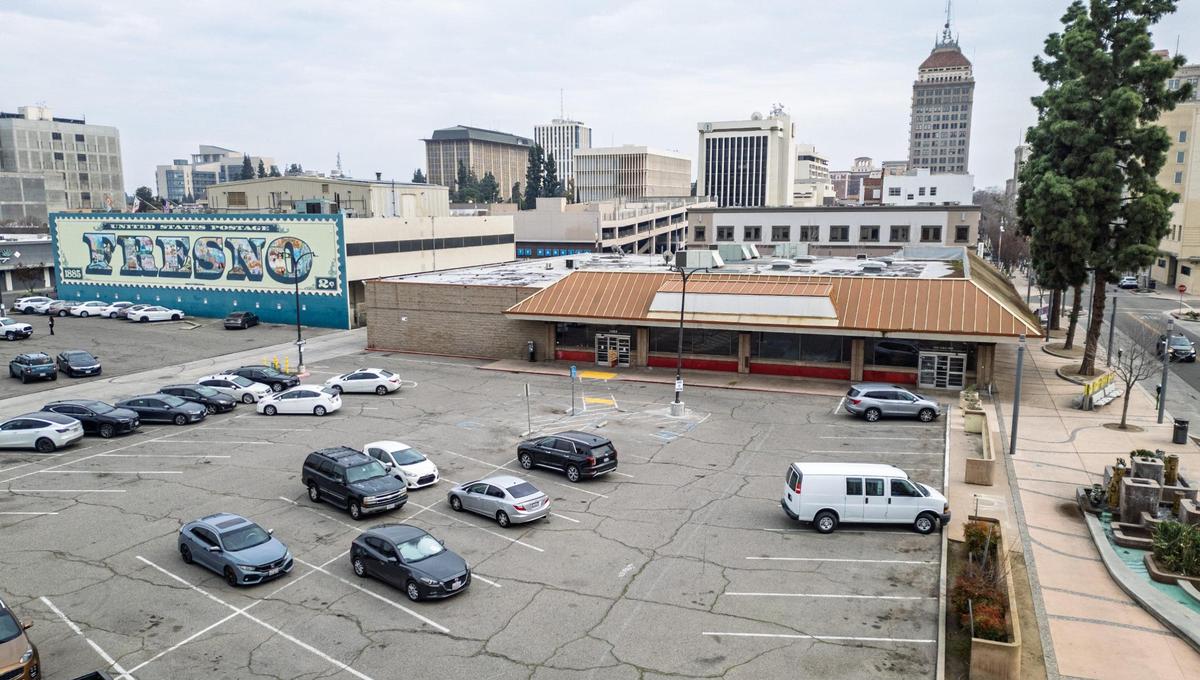 The parking lot of the now-closed CVS Pharmacy building at Fulton and Tuolumne streets in downtown Fresno is planned as the possible site for up to 100 apartments in the city’s Housing Element. It’s one of almost 2,500 sites around Fresno that are on a city inventory of available sites for would-be developers to build much-needed new housing.