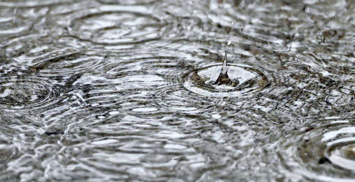 Rains creates a pattern of circles on a dreary Tuesday morning, Dec. 27, 2022 in Fresno.