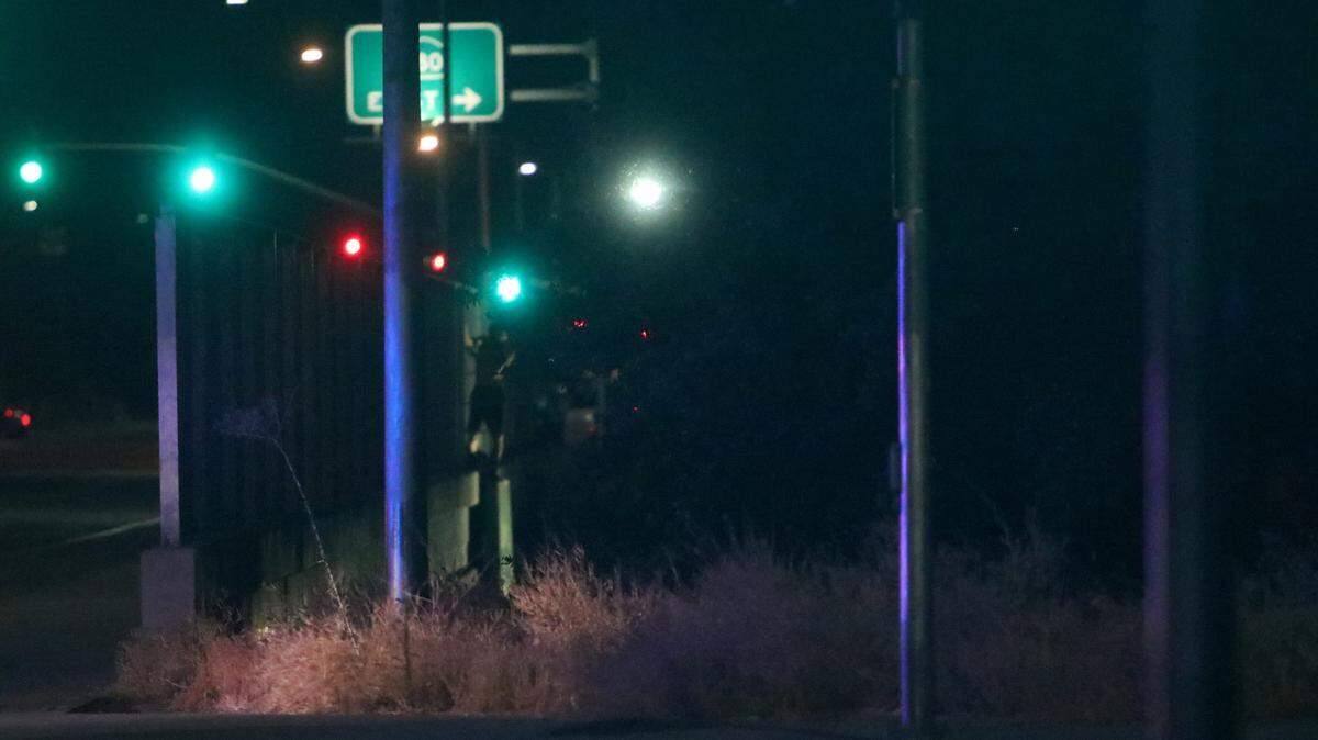 Highway 180 had to be closed Thursday night after a person threatened to jump from the an overpass near Peach Avenue.