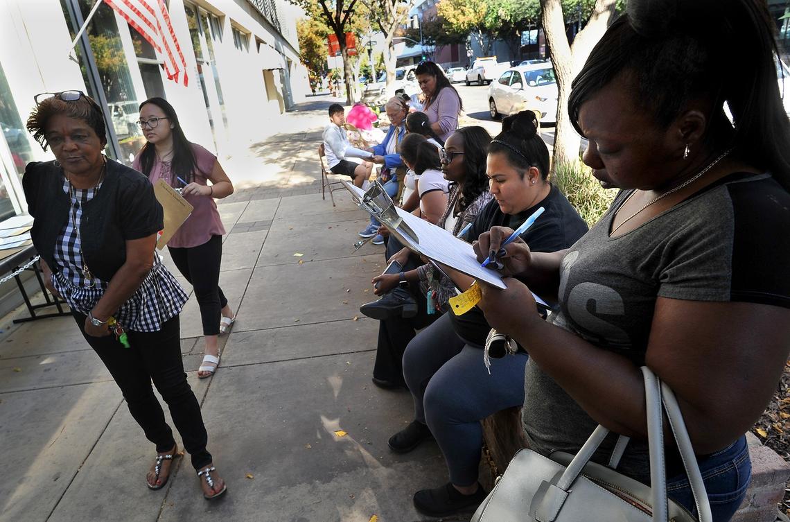 It was standing room only as people lined Kern Street in front of the Fresno County Elections Office, registering to vote in Tuesday’s election,  Nov. 6, 2018.