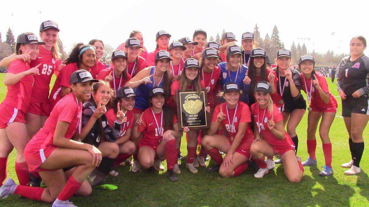 The Buchanan High girls soccer team pose for a photo after a 2-1 victory over Clovis North in the Central Section Division I soccer championship on Saturday, Feb. 26, 2022.