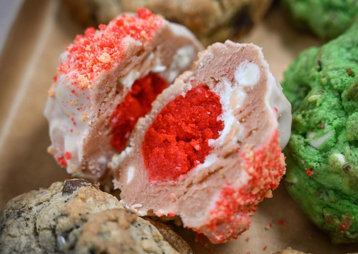 A strawberry shortcake chunky cookies packaged with a sampler pack of Asian cookies from Saint Goods at their workplace inside the Clovis Culinary Center on Wednesday, Nov. 15, 2023.