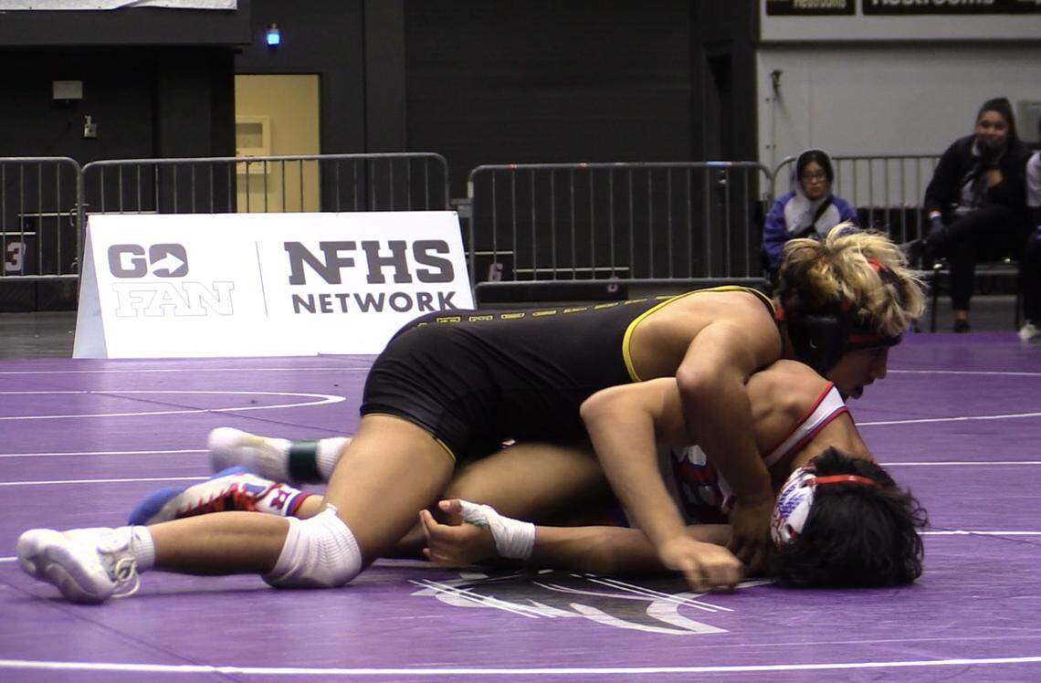 Jacob Perez of Monache won by decision over Paris Ruiz of Buchanan in 134 pounds at the Central Section Masters at Selland Arena in Fresno, California on Saturday, Feb. 17, 2024.