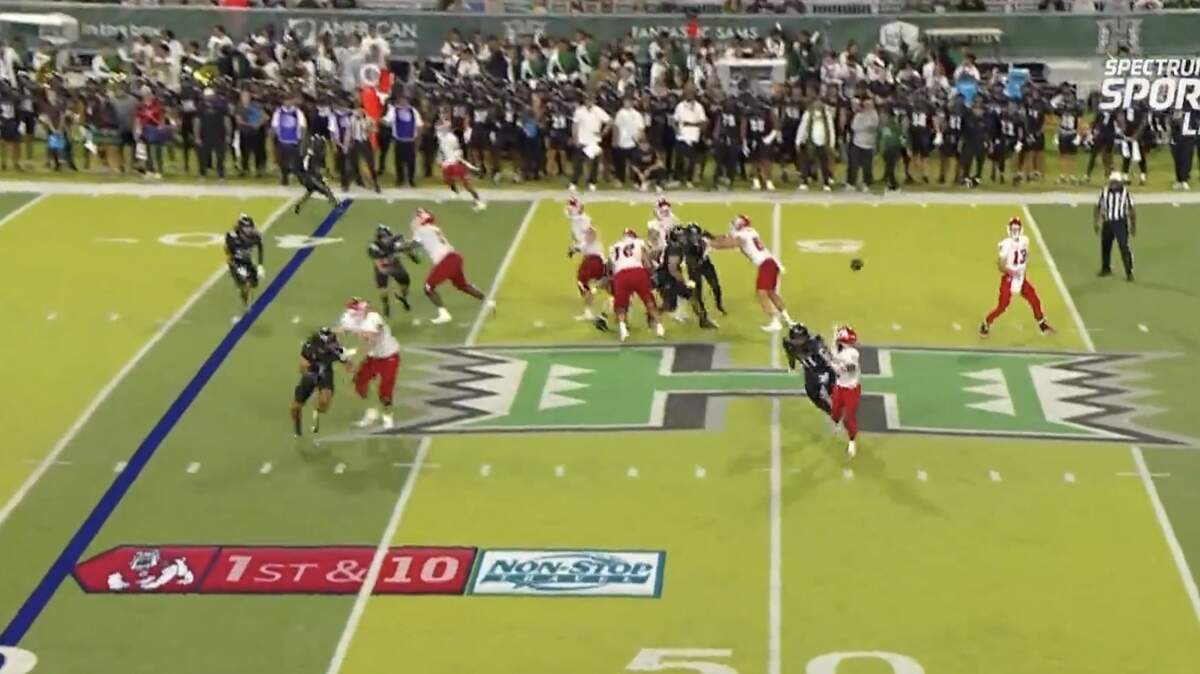 The backward pass that was ruled a fumble that led to a Hawaii touchdown against Fresno State.