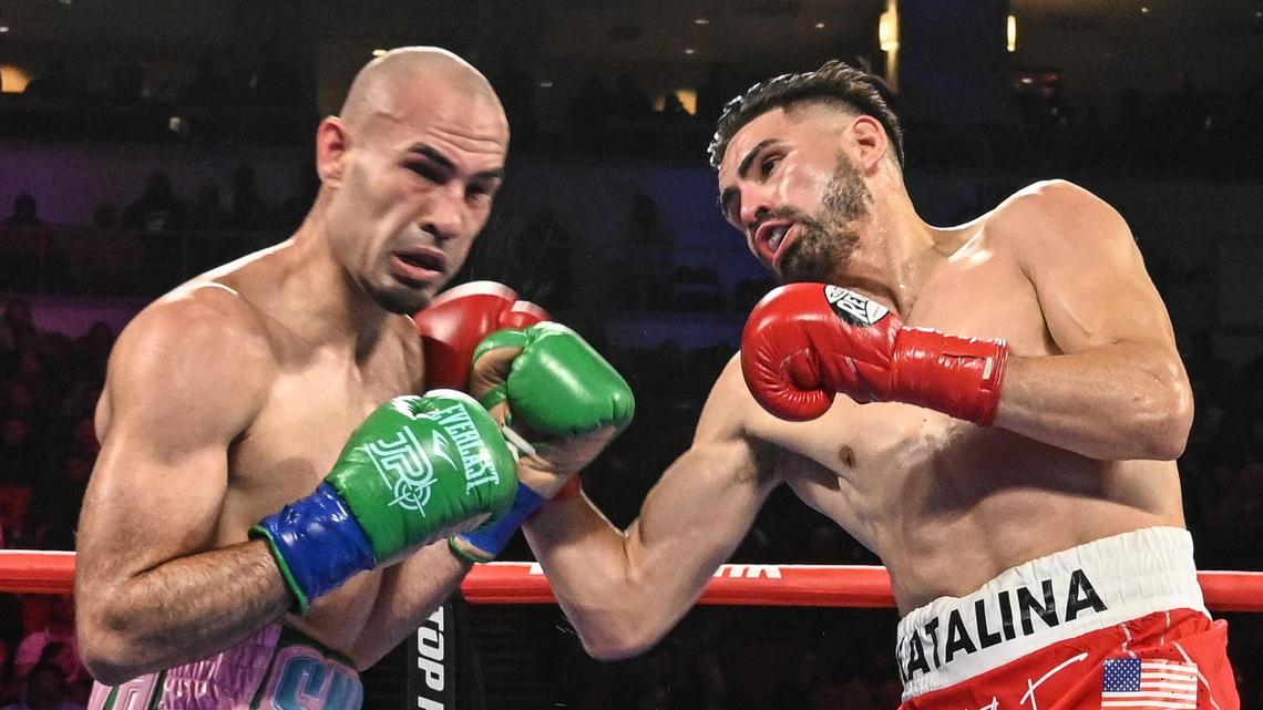 Jose Ramirez, right, lands a punch against Jose Pedraza during their junior welterweight fight at the Save Mart Center on Friday, March 4, 2022.