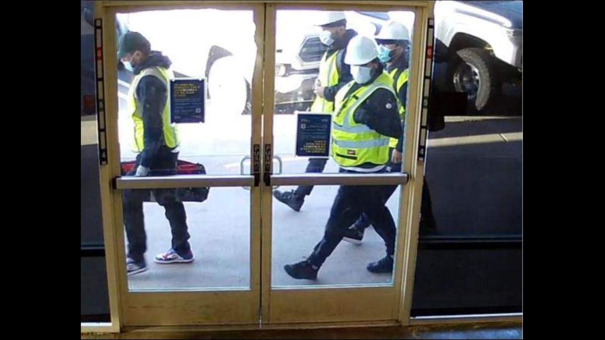 Several of the wanted suspects are seen outside a Golden 1 Credit Union in Rocklin on Sept. 22, 2024, according to the federal affidavit.