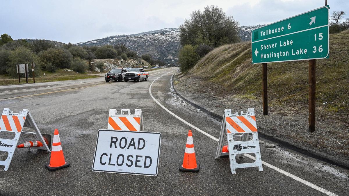 Caltrans and CHP have the road closed at Highway 168 and Lodge Road at the bottom of the four lane following heavy snow along the foothills route to Shaver Lake on Monday, Feb. 27, 2023.
