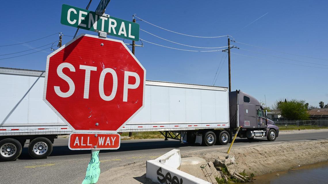 A truck passes through the intersection of Central and Cherry avenues in Malaga on April 6, 2023. On Friday, the California Air Resources Board voted to overhaul emission standards for the trucking and rail industries.