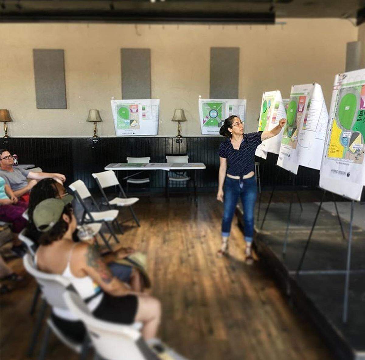 Different designs for a potential Broadway Parque at the corner of Broadway and Elizabeth streets in Fresno, California, are displayed during a 2019 community meeting. The park’s name has been been changed to South Tower Park.
