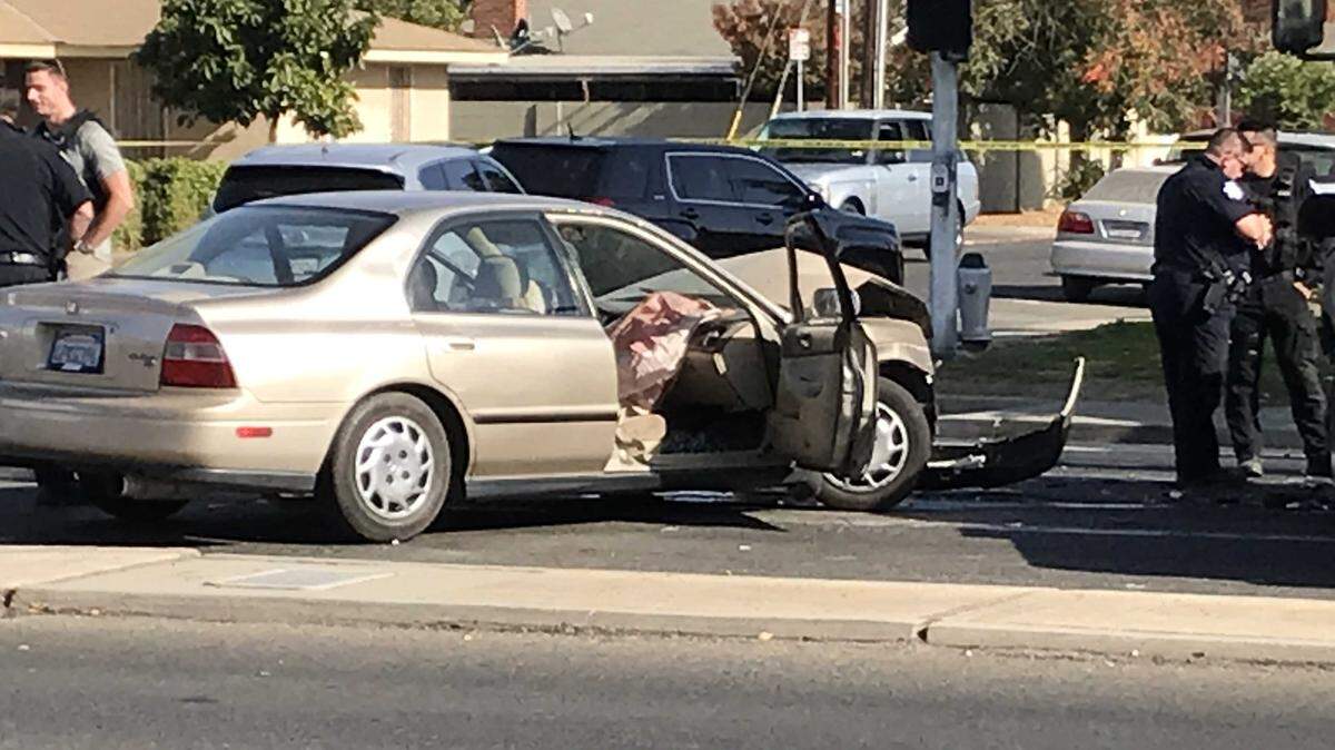 A Honda police say was driven during two armed robberies Thursday in Fresno collided with an undercover police vehicle at North First Street and East Princeton Avenue.