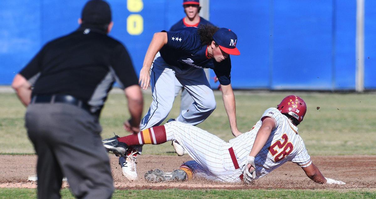 San Joaquin Memorial’s Colby Evans, center, tags out Christian Badger, right, at second base in Coca Cola Classic baseball championship action Saturday, March 12, 2022 in Clovis. Clovis West ended the game defeating Memorial 9-2 in six innings for the championship.