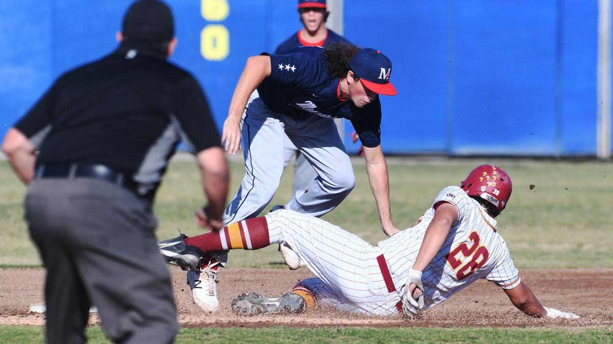 San Joaquin Memorial’s Colby Evans, center, tags out Christian Badger, right, at second base in Coca Cola Classic baseball championship action Saturday, March 12, 2022 in Clovis. Clovis West ended the game defeating Memorial 9-2 in six innings for the championship.