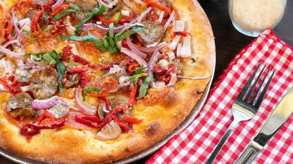 This Paesano pizza from Russo’s New York Pizzeria features pepperoni, sliced sausage, roasted peppers, red onions, Pecorino Romano cheese, and fresh garlic. Russo’s is planning to open five locations in the Fresno area, with the first one opening later this year in Clovis.