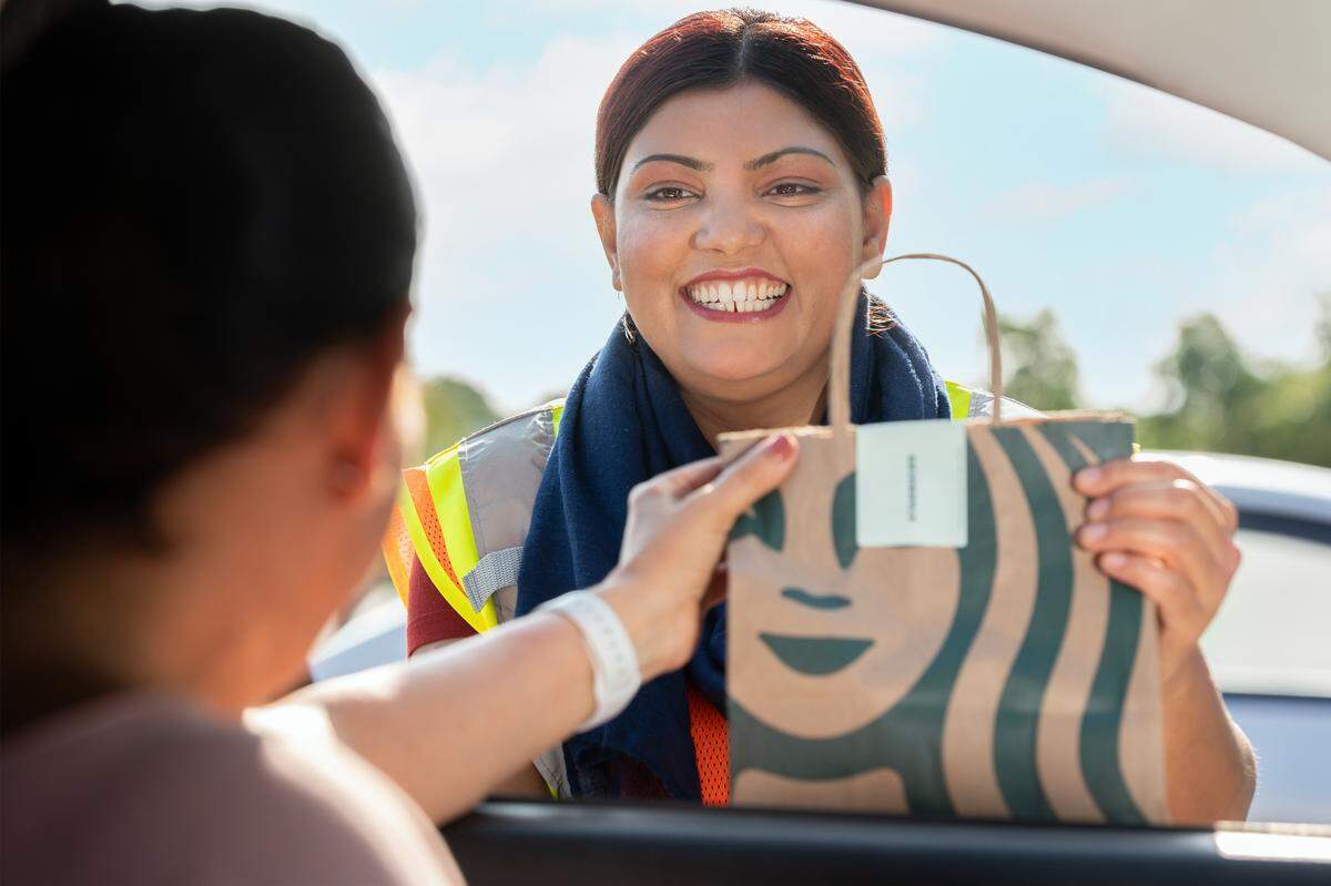 Starbucks and Target are rolling out a new feature where shoppers can add a Starbucks drink to a Target drive-up ordering, getting both without leaving their car.