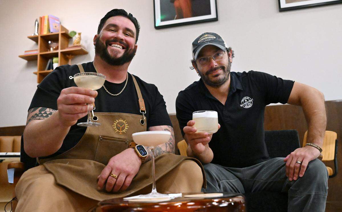 Dustin Llanes, general manager of The Golden Hour Cocktail Lounge and Alex Costa of Maple & Copper Distilling Company have joined forces to offer something unique, a blending of in-house distilled spirits, cocktail drinks and a lounge with throwback vibes for customers. Both are adjacent to Mad Duck Craft Restaurant and Brewing on Copper Avenue. Photographed Wednesday, Feb. 4, 2026 in Fresno.