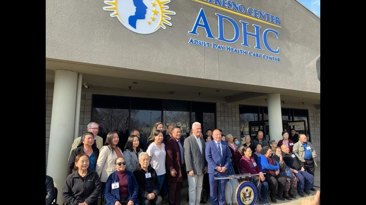Rep. Jim Costa, center, stands with the administrators and staff of the Adult Day Health Care Center, a program run by The Fresno Center. The Fresno Democrat awarded a $1.5 million grant to the program.