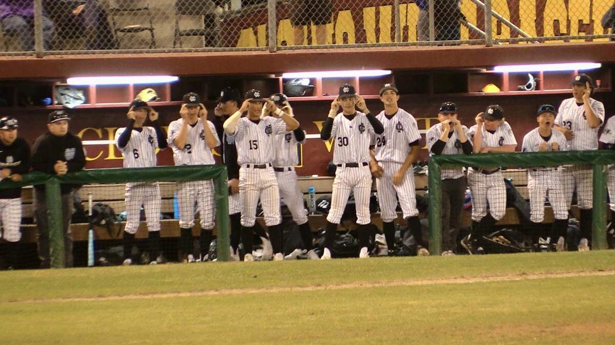 The Clovis North dugout gives instructions during the Fresno Easter Classic championship against Clovis on Wednesday, March 27, 2024.