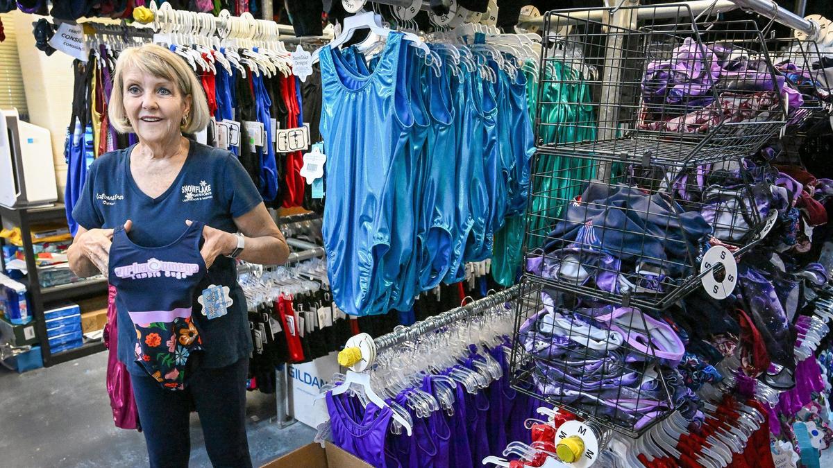 LaDonna Snow, owner of Snowflake Designs, a gymnastics wear design and manufacturing company, shows off some of the work her company does in their Clovis shop on Friday, July 26, 2024.