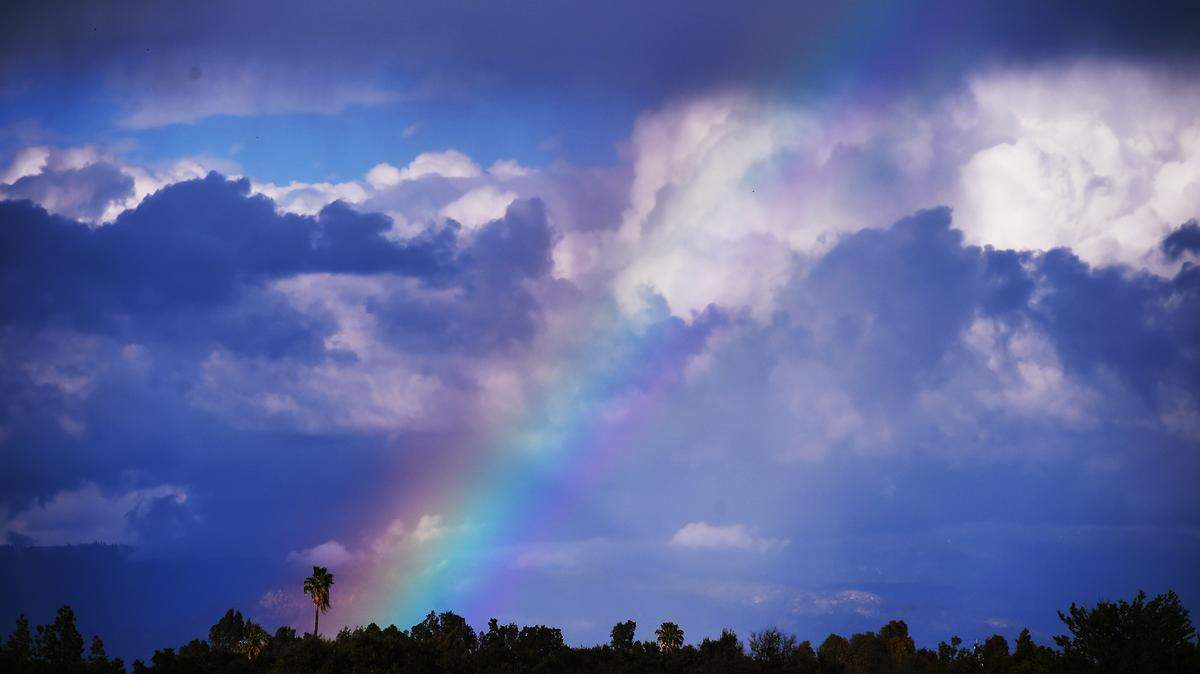 A rainbow seen near foothills east of Clovis on Tuesday afternoon, April 2, 2019.