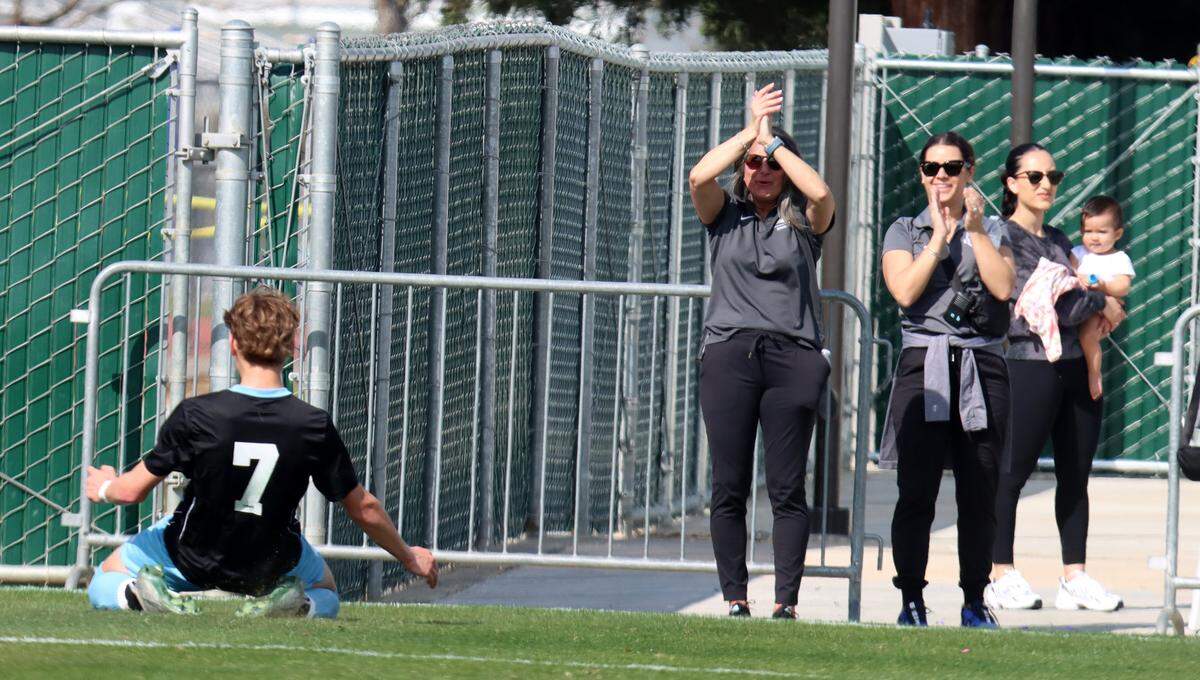Clovis North sophomore midfielder Nixon Hansen celebrates a first-half goal against Ridgeview in the CIF Central Section Division I championship at Clovis East on Feb. 24, 2024. Clovis North won 3-2 (overtime) .