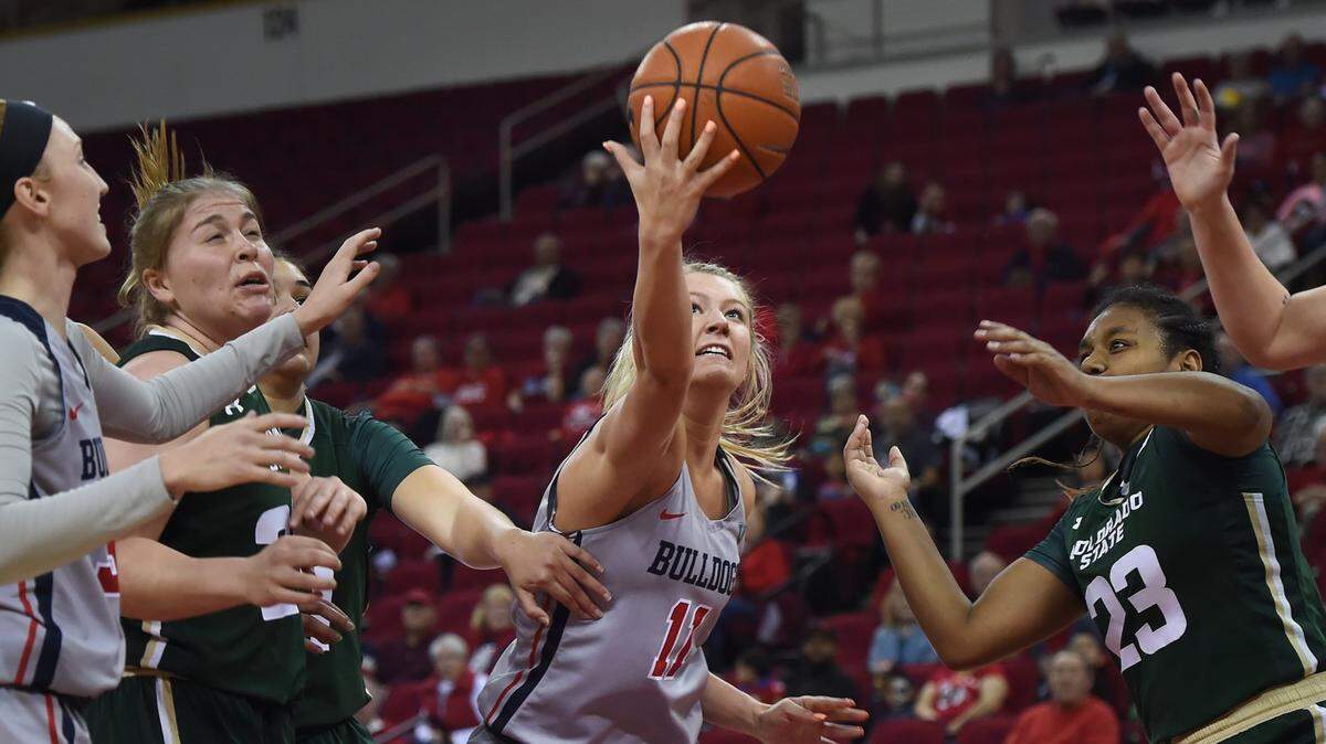 Fresno State’s Maddi Utti (center), shown in a file photo, recorded a team-high 21 points and 11 rebounds to help the Bulldogs in a 77-70 win Wednesday at Air Force.