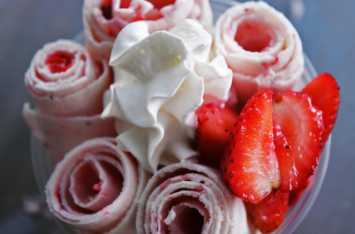 La Nina Fresa, consisting of hand-rolled ice cream, strawberries and whipped cream at the Let’s Roll ice cream shop in Fresno is shown in this Fresno Bee file photo from Oct. 8, 2021.