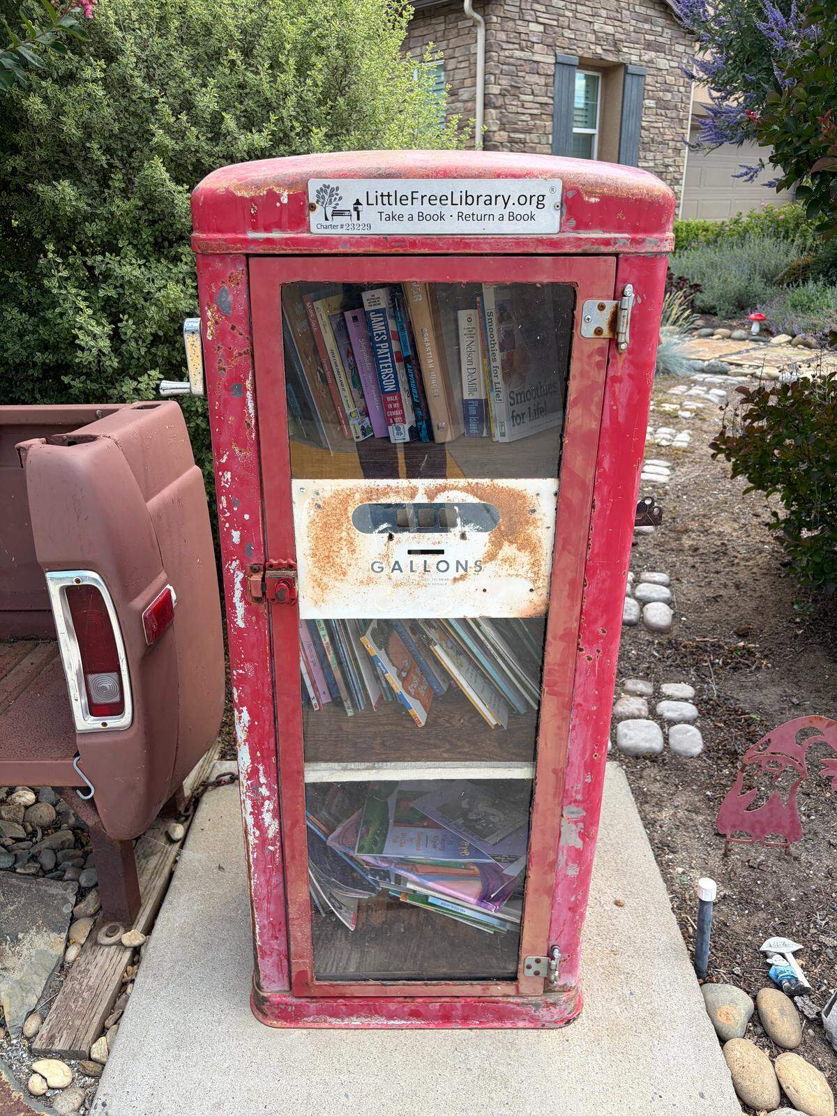A three-story bright red locker at the corner of Swift and McKelvy serves as a Little Free Library run by Clovis natives Kimberly and John Schaefer.