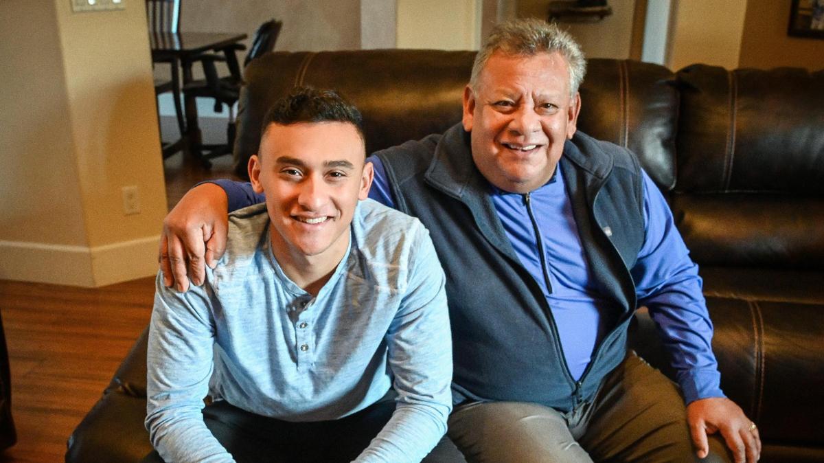 Longtime Fresno television newscaster Rich Rodriguez, right, sits with his son Rhett, who is now following in his father’s TV news footsteps by landing a job as a reporter at KSEE 24 and CBS 47.
