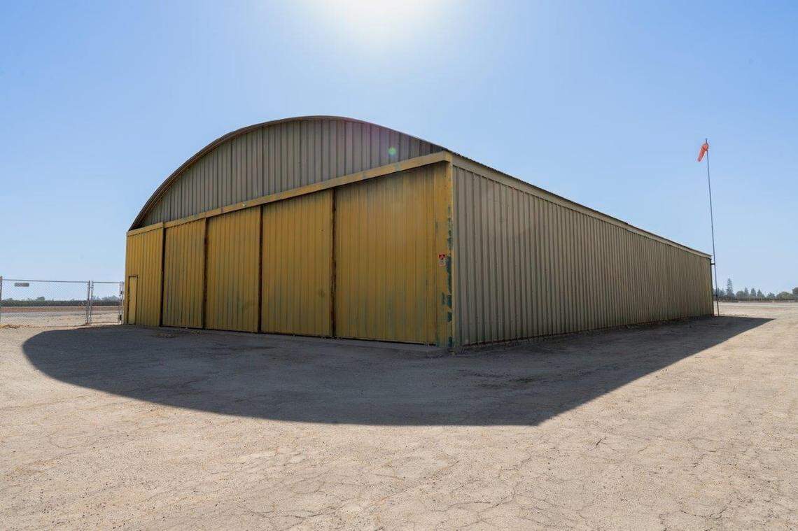 Eckert Field, a small airport facility in the small South Valley town of Strathmore, is for sale for $1.275 million. The airport has ties to World War II.