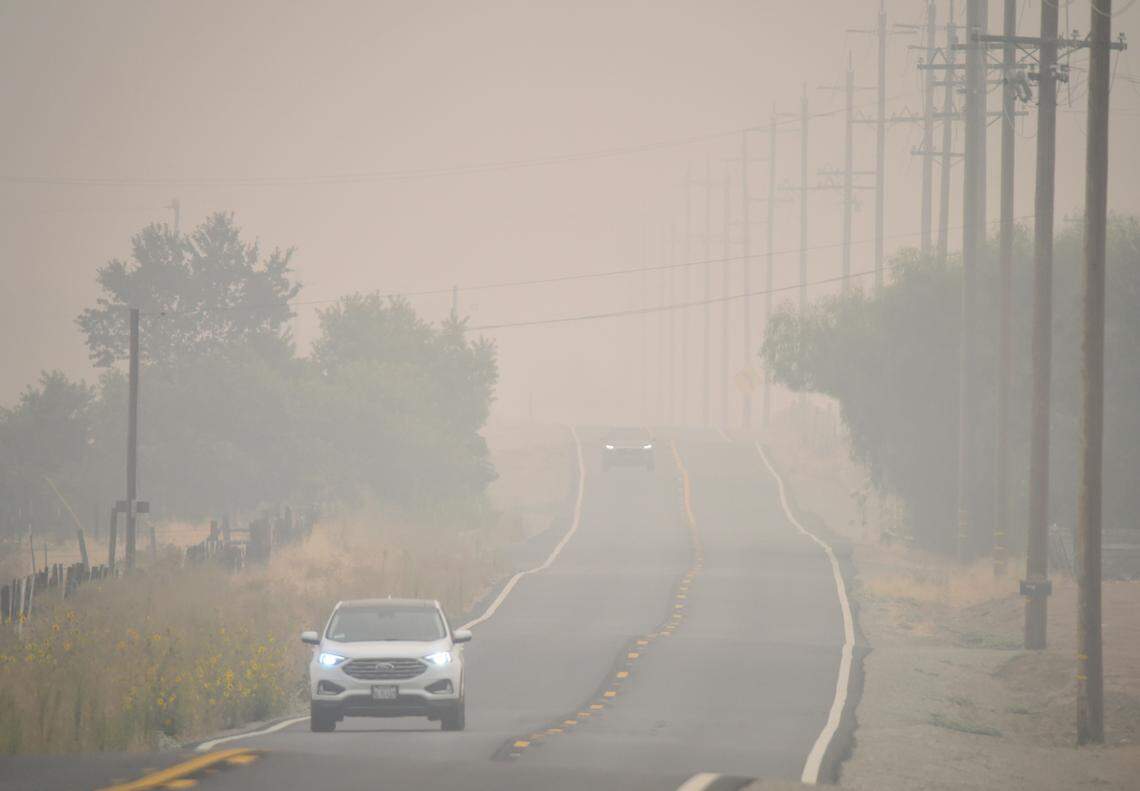 Bad air quality is visible as smoke from the Creek Fire and other wildfires cloaks the central San Joaquin Valley, here on Tollhouse Road east of Clovis, Monday Sept. 14, 2020.