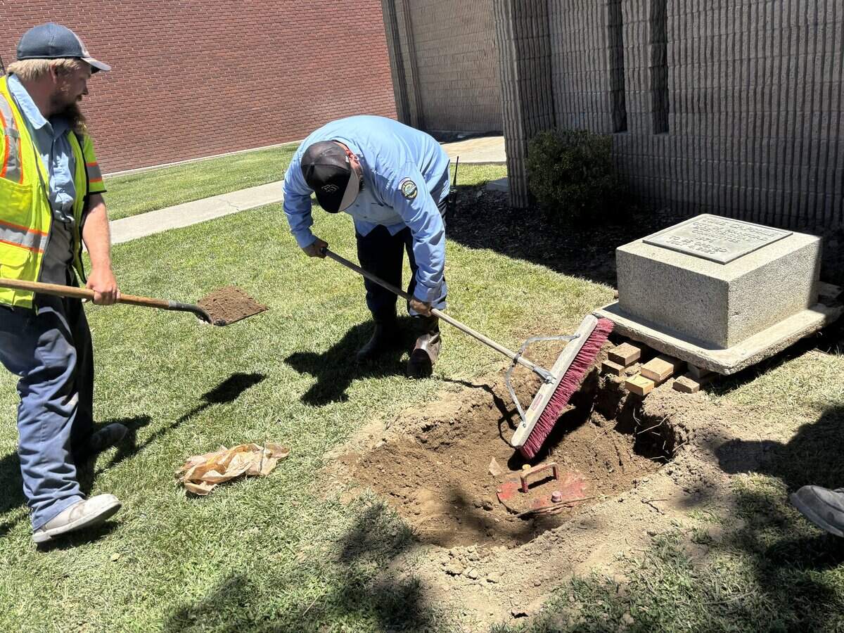 Hanford's public works employees removed the&nbsp;time capsule&nbsp;marker&nbsp;stone&nbsp;exposing the red cylindrical capsule&nbsp;around 12 p.m. on Thursday as the city&nbsp;prepared for&nbsp;its&nbsp;opening later in the day.