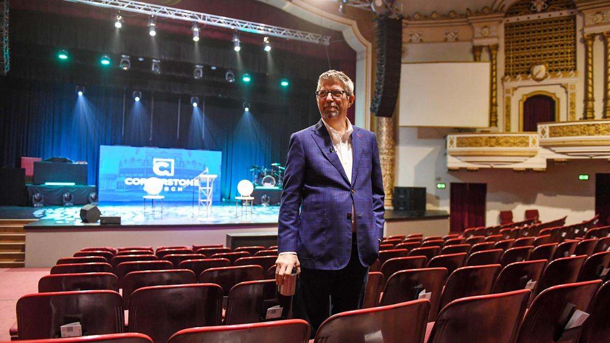 Pastor Jim Franklin of Cornerstone Church stands in the church’s auditorium before announcing the installation of several dry hydrogen peroxide, or DHP, units at the church in downtown Fresno on Wednesday, March 10, 2021. Franklin says patented technology will continuously clean the air of potential coronavirus microbes as well as fight against any other viruses, bacteria, mold, odors and even insects.