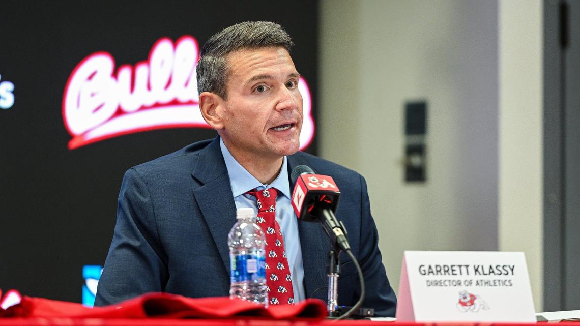 Garrett Klassy speaks to the media and other VIPs after being introduced as Fresno State’s athletic director during a news conference at Fresno State’s Josephine Theater on Friday, June 28, 2024.