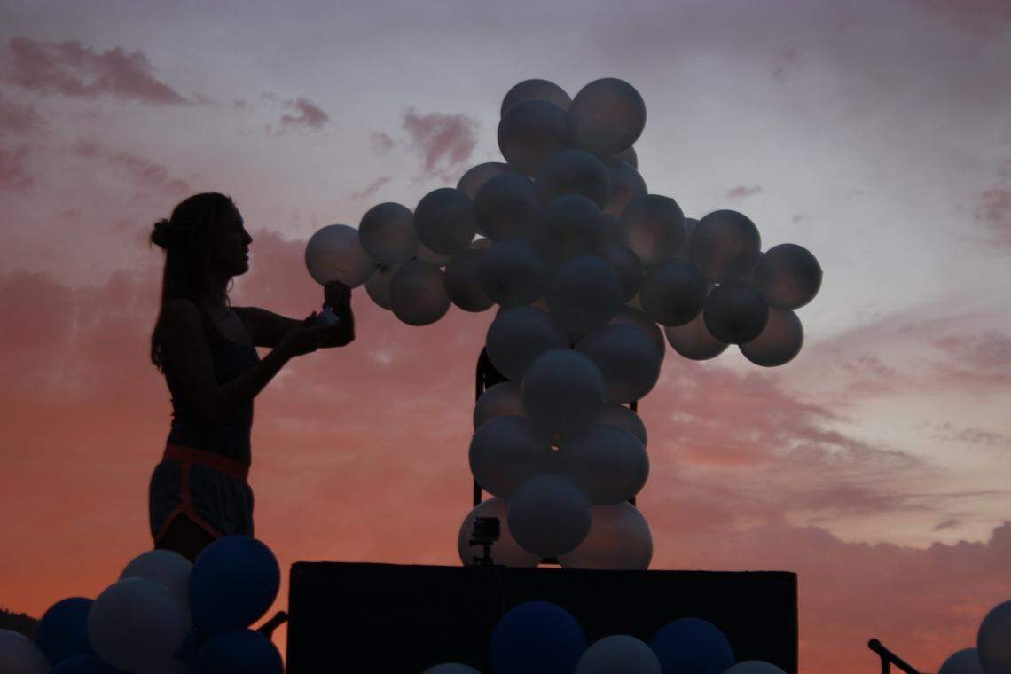 Balloons are formed into the shape of a Christian cross at a Fellowship of Christian Athletes event in Oakhurst.