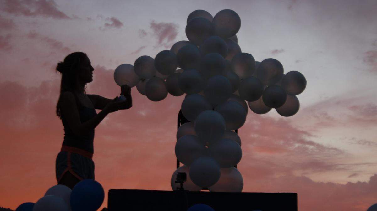 Balloons are formed into the shape of a Christian cross at a Fellowship of Christian Athletes event in Oakhurst.