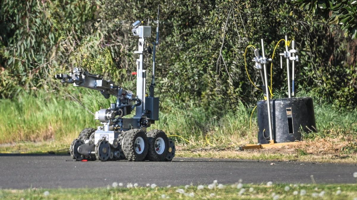 A Fresno police robot at the scene of a suspicious ice chest that bomb squad crews detonated as a precaution near Armstrong Avenue and Kings Canyon Boulevard on Tuesday, March 8, 2022.