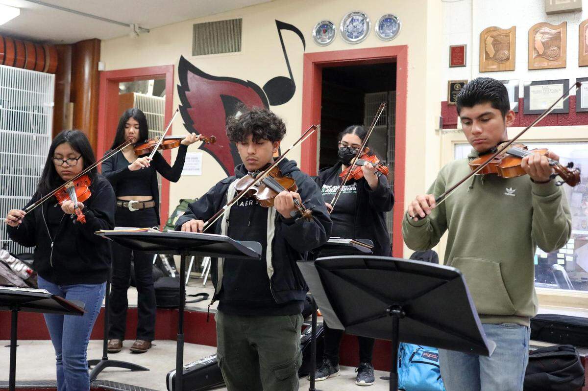 Orosi High School Mariachi Cardenal members during their mariachi class on Wednesday, March 15, 2023.