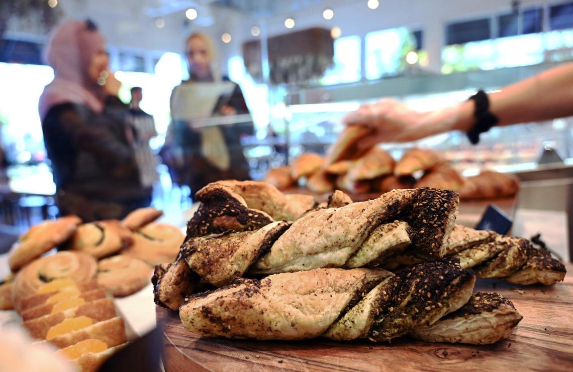 Za’atar twists, foreground, are just a hint at the wide selection of pastries offered at Yava Bakery and Cafe. Photographed Monday, Oct. 3, 2022 in Fresno.