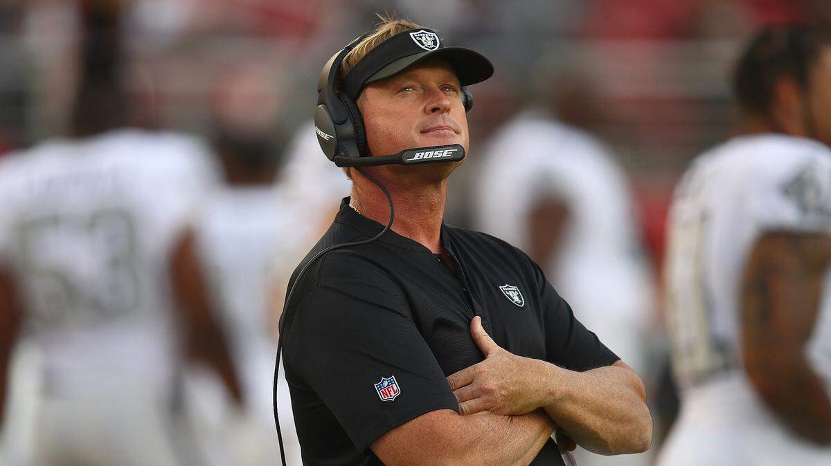 Oakland Raiders head coach Jon Gruden watches before an NFL football game against the San Francisco 49ers in Santa Clara, Calif., Thursday, Nov. 1, 2018.