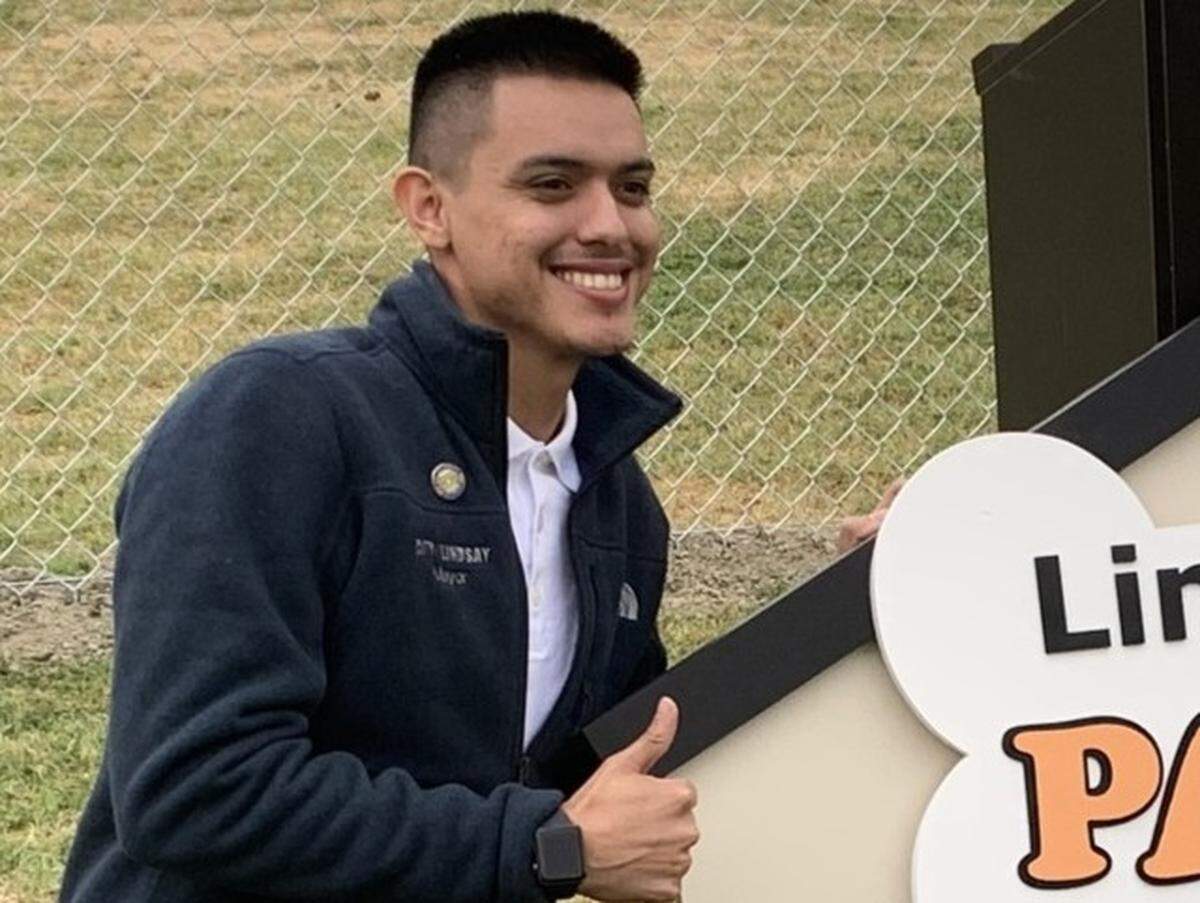 Lindsay Mayor Hipolito Angel Cerros poses for pictures at a dog park in Lindsay, according to a photo on the city’s Facebook posted on May 3, 2023.