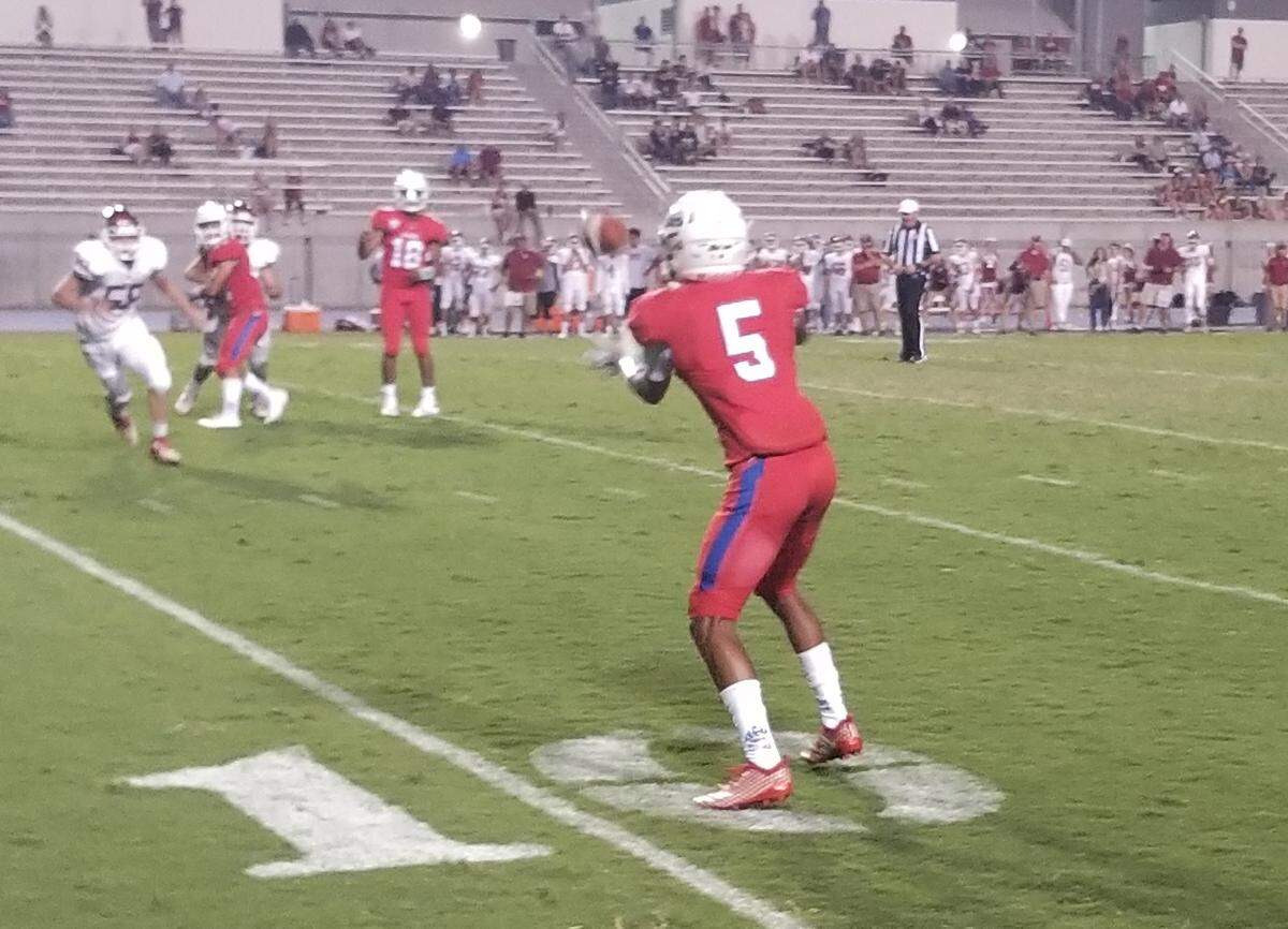 Buchanan’s Jalen Cropper waits for the pass he turned into a 10-yard touchdown Friday night against Paso Robles.