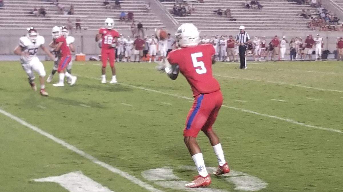 Buchanan’s Jalen Cropper waits for the pass he turned into a 10-yard touchdown Friday night against Paso Robles.