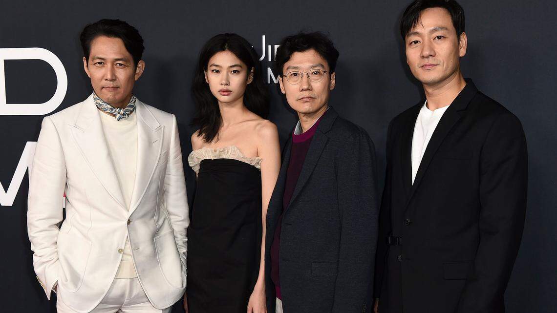 From left, Lee Jung-jae, Jung Hoyeon, Hwang Dong-hyuk and Park Hae Soo arrive at a red carpet event for “Squid Game” on Monday, Nov. 8, at NeueHouse Hollywood in Los Angeles.