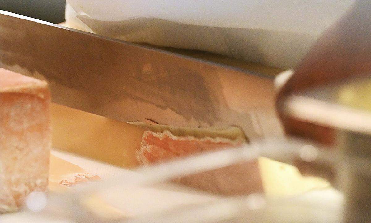 Cheese is sliced at Jimmy Pardini's new Italian restaurant Willow Osteria Friday, Nov. 7, 2025 in Clovis.