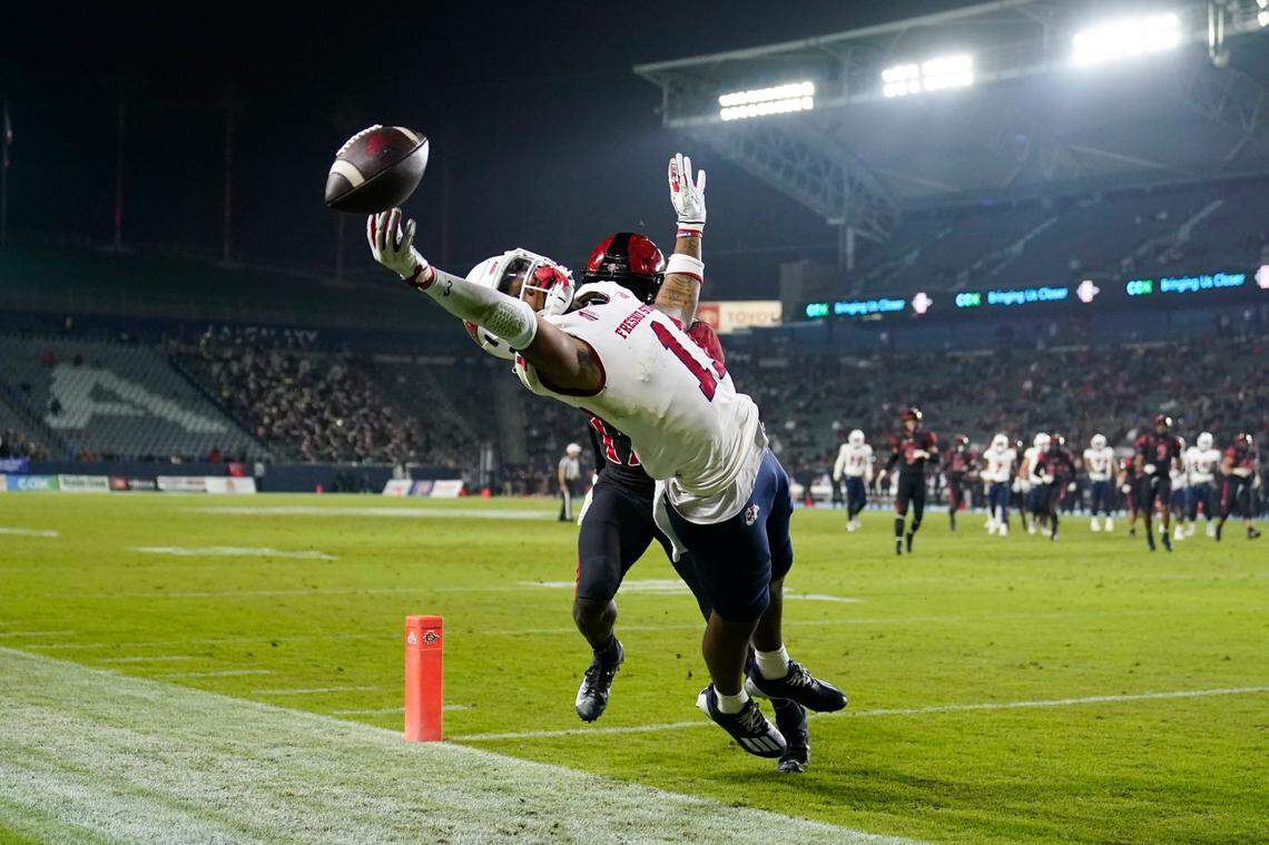 Fresno State’s Josh Kelly, front, misses a pass to the end zone during the first half of the team’s NCAA college football game against San Diego State on Saturday, Oct. 30, 2021, in Carson, Calif. (AP Photo/Jae C. Hong)